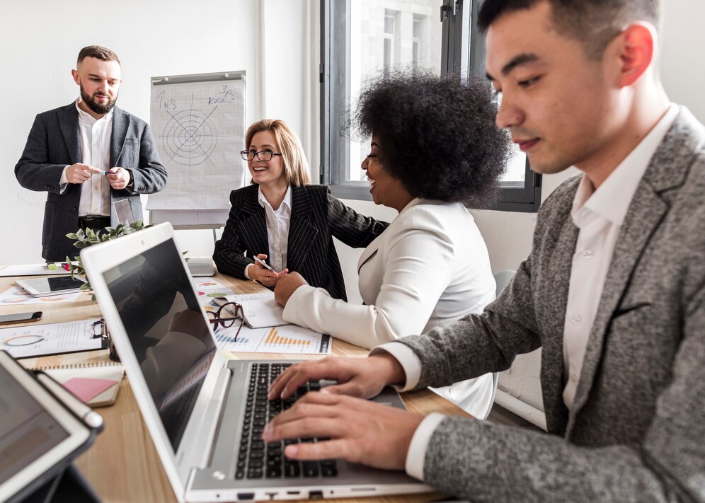 front-view-business-people-meeting_23-2148427094 front-view-business-people-meeting_23-2148427094