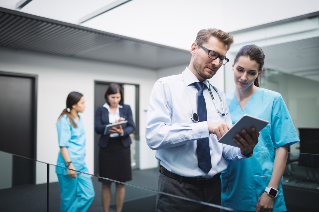 doctor-nurse-discussing-digital-tablet_107420-84813 doctor-nurse-discussing-digital-tablet_107420-84813